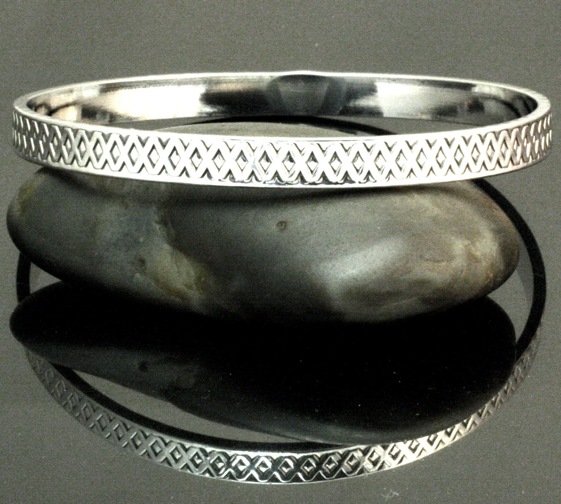 Criss-cross Silver Bangle