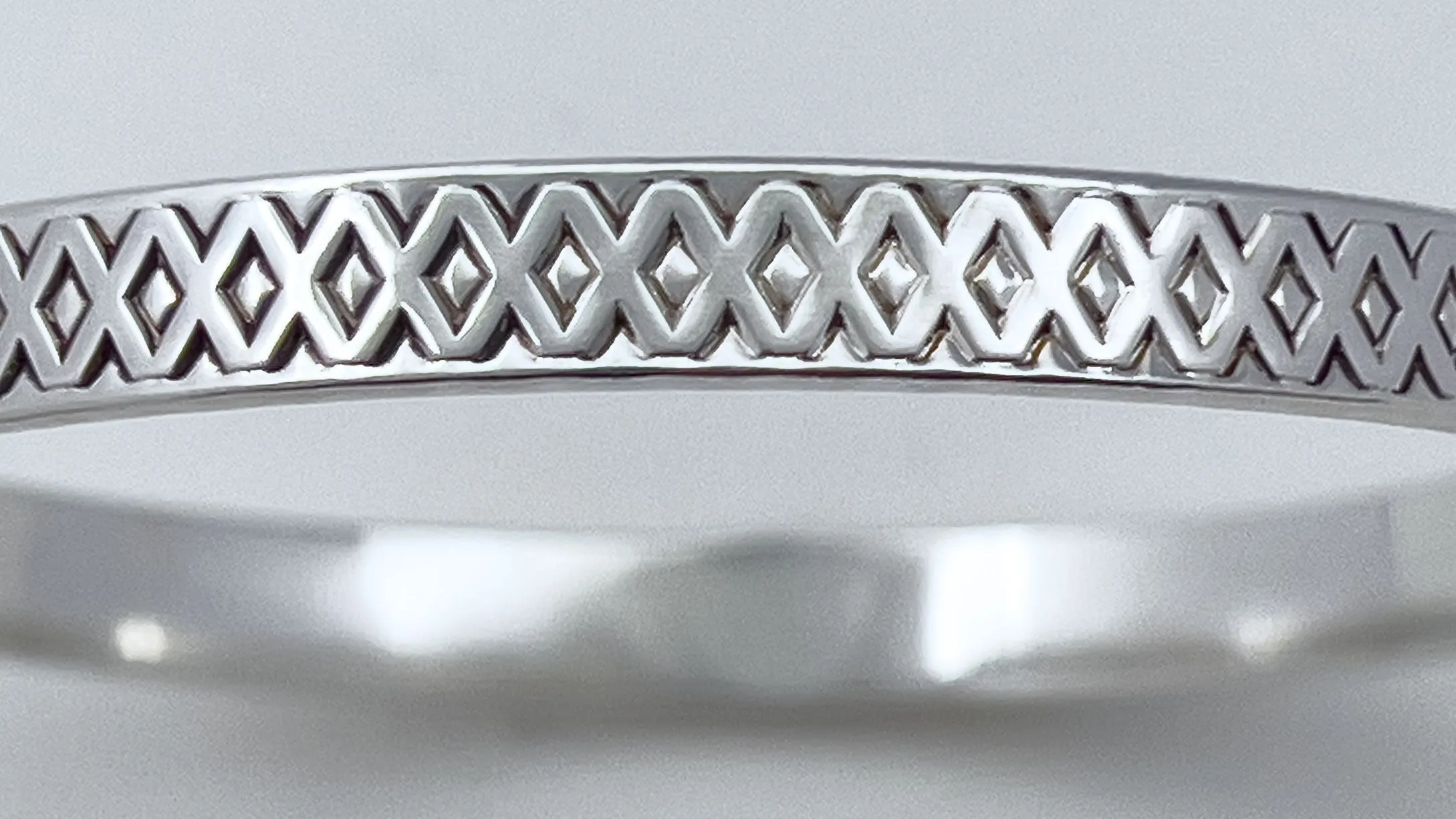 Criss-cross Silver Bangle