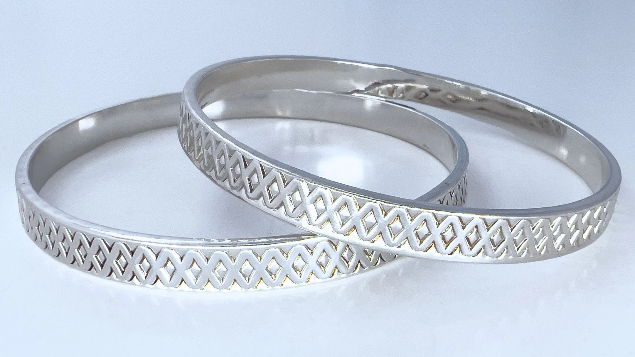 Criss-cross Silver Bangle