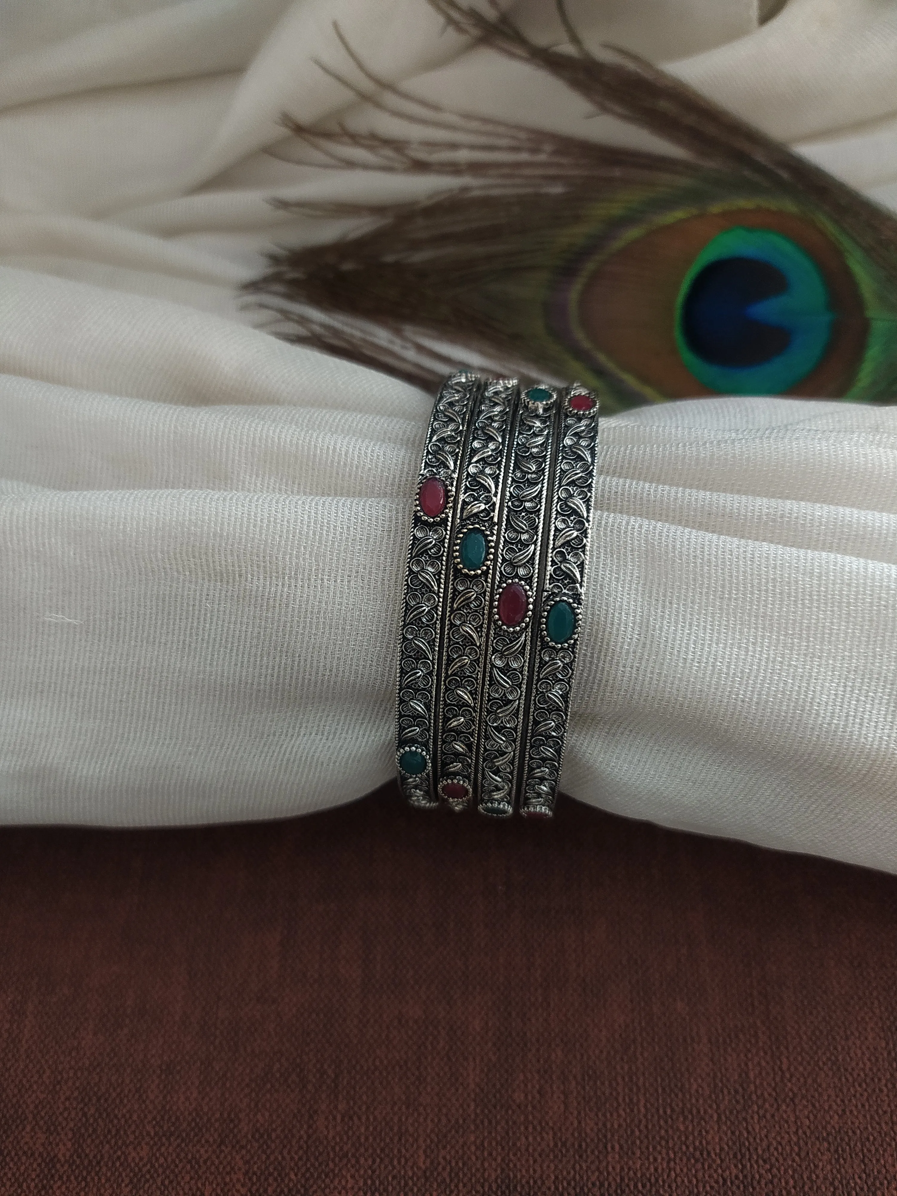 German Silver Oxidised Bangles with Ruby and Green Stones (Set of 4, Sizes 2.4, 2.6, 2.8)