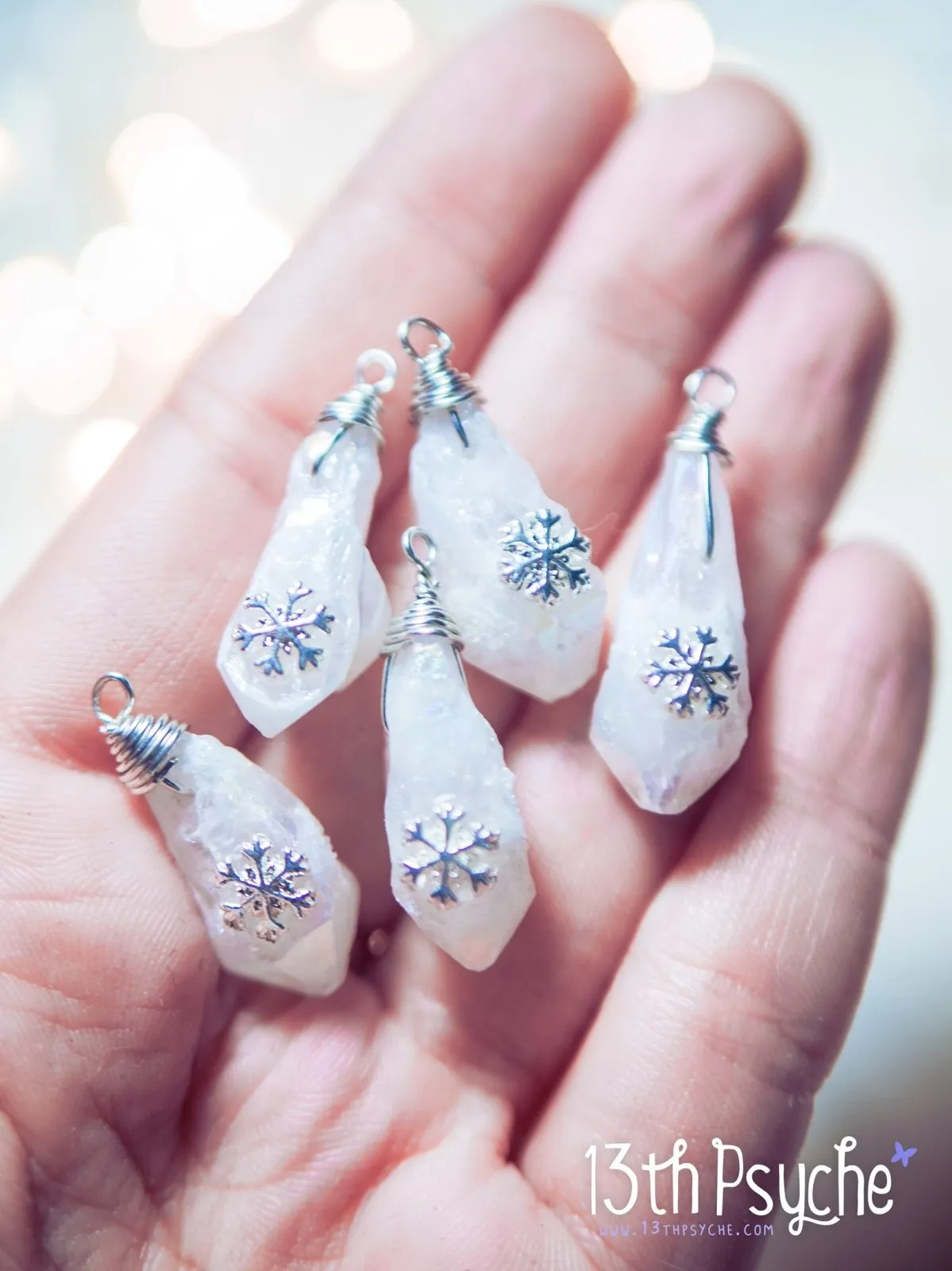 White raw stone earrings with silver snowflake