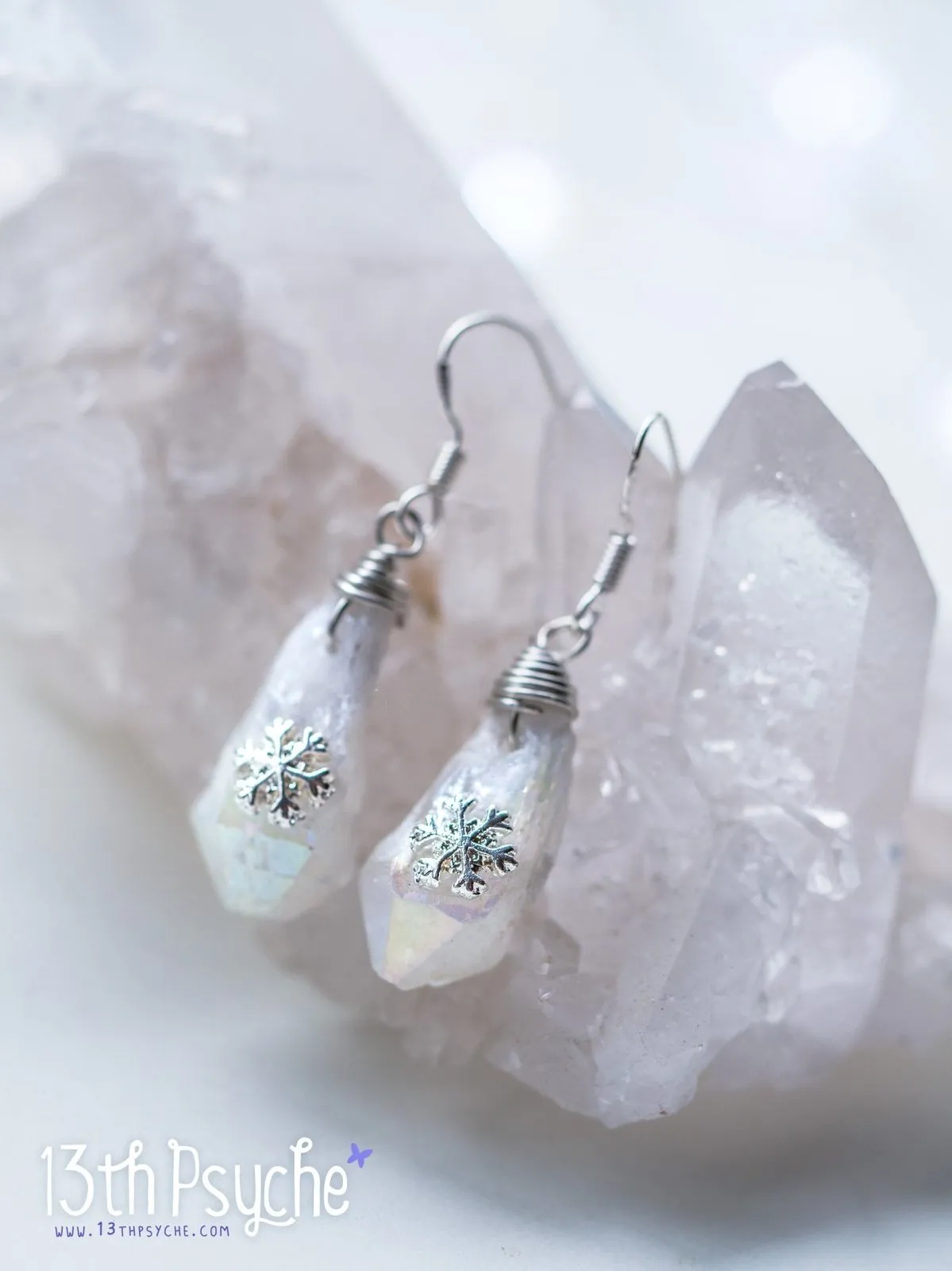 White raw stone earrings with silver snowflake