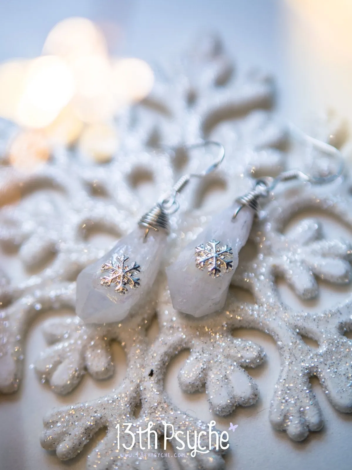 White raw stone earrings with silver snowflake